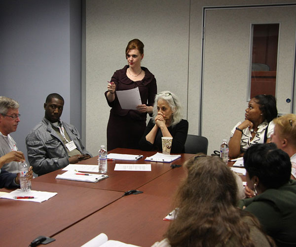 A woman leading a focus group